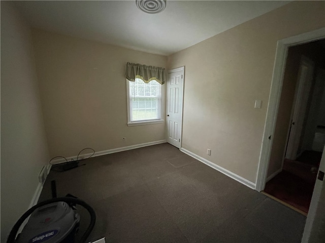 unfurnished room with carpet floors