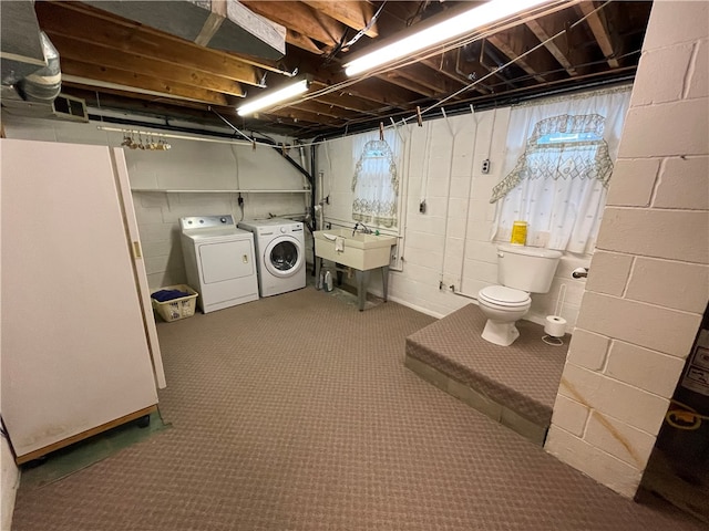 interior space with washer and dryer and sink