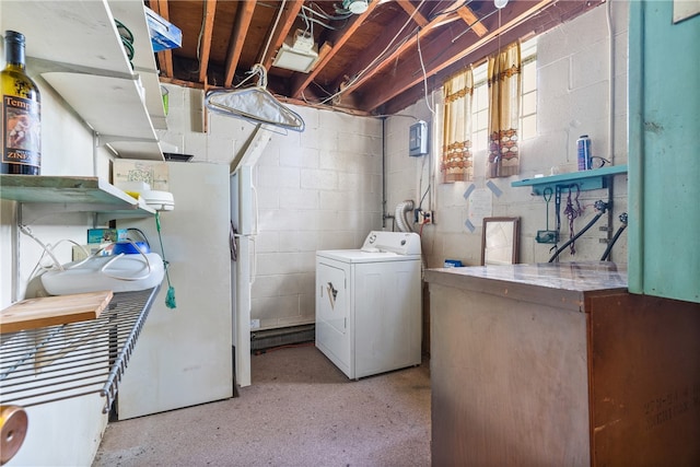 clothes washing area featuring washer / clothes dryer