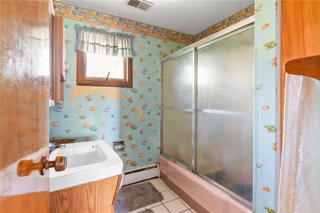 bathroom with a baseboard radiator, shower / bath combination with glass door, tile floors, and sink