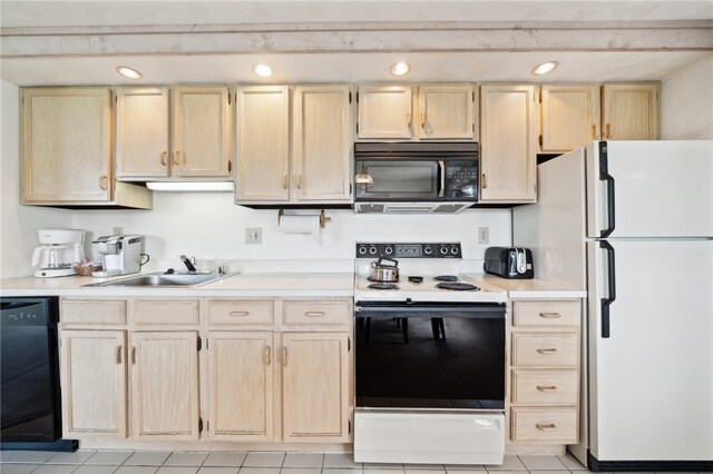 kitchen featuring light brown cabinetry, sink, light tile floors, and black appliances