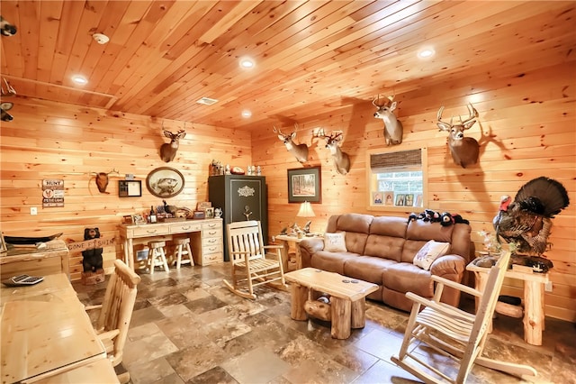 tiled living room featuring wooden ceiling and wooden walls