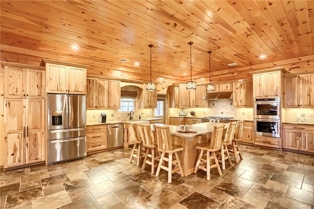 kitchen with wooden ceiling, a center island, stainless steel appliances, and tile floors