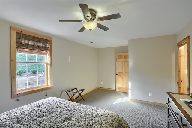 bedroom featuring ceiling fan and carpet floors