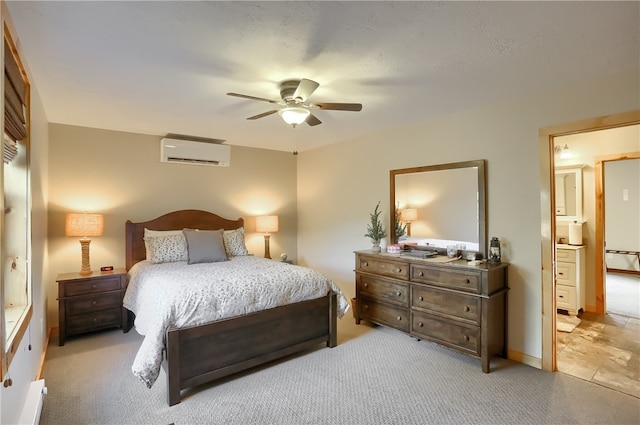 tiled bedroom featuring connected bathroom, ceiling fan, a baseboard radiator, and an AC wall unit