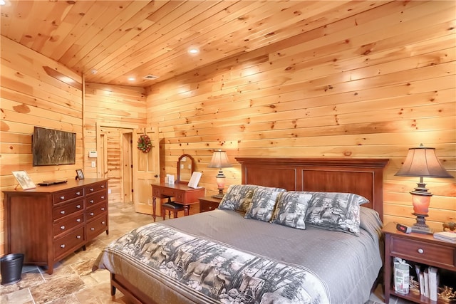 bedroom with wood ceiling, wooden walls, and light tile floors