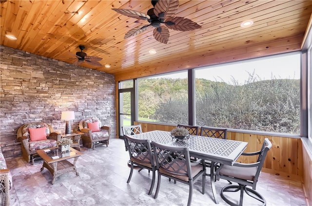 sunroom featuring wooden ceiling and ceiling fan