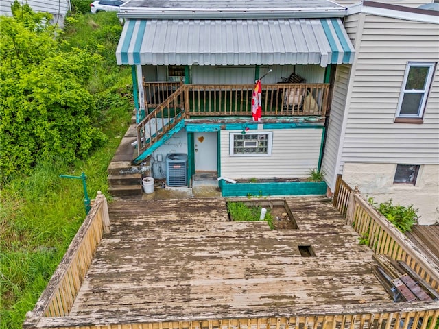 wooden deck with central AC unit