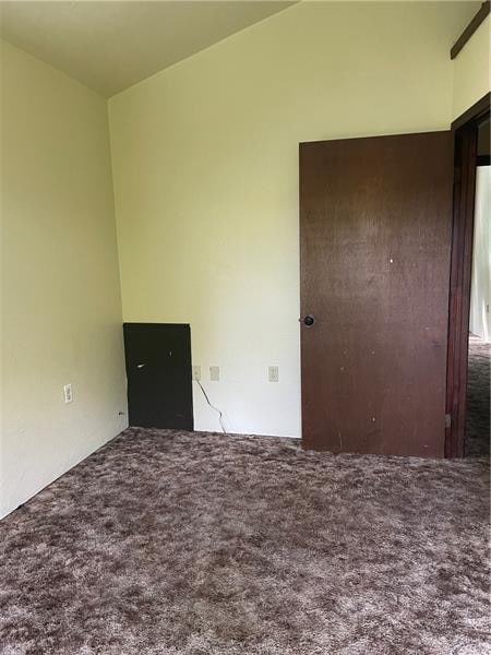 unfurnished room with carpet floors