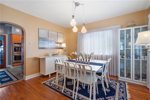 dining area featuring hardwood / wood-style floors