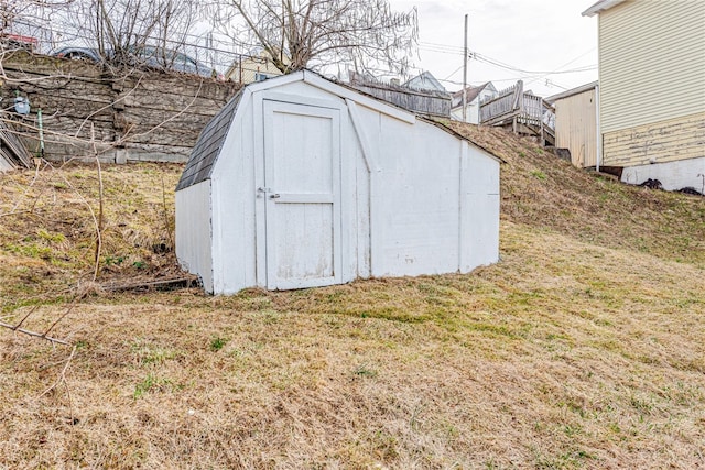 view of outdoor structure featuring a yard