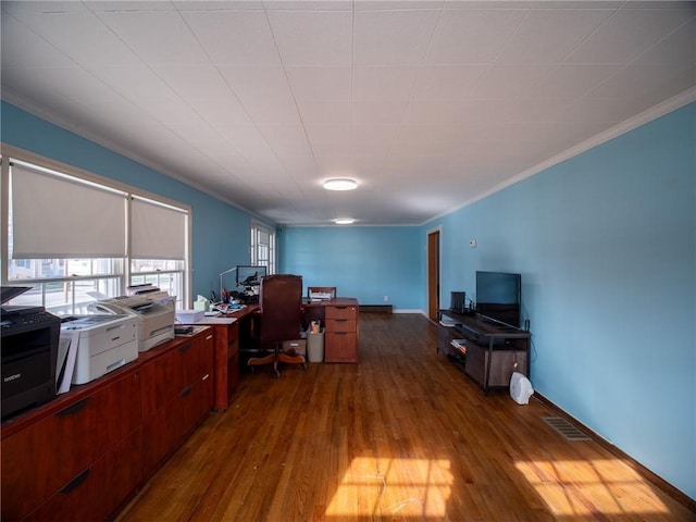 office space with ornamental molding and dark hardwood / wood-style floors