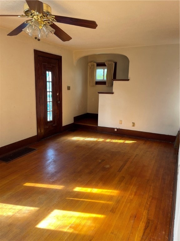 interior space featuring hardwood / wood-style flooring and ceiling fan