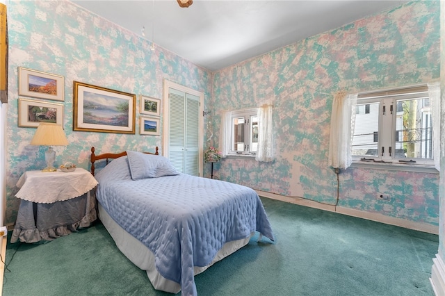 carpeted bedroom featuring a closet