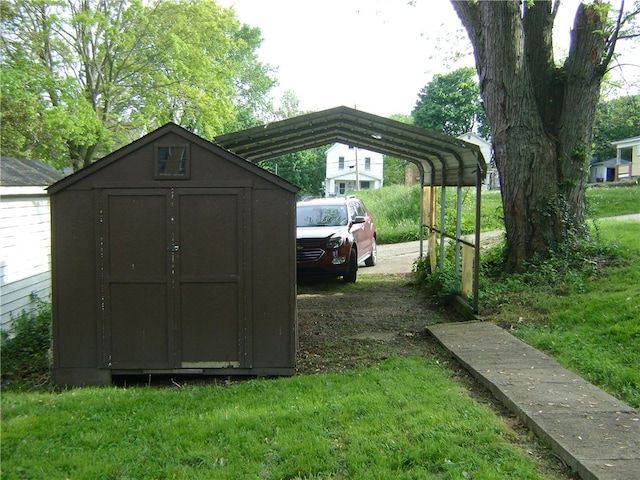 view of outdoor structure featuring a lawn and a carport