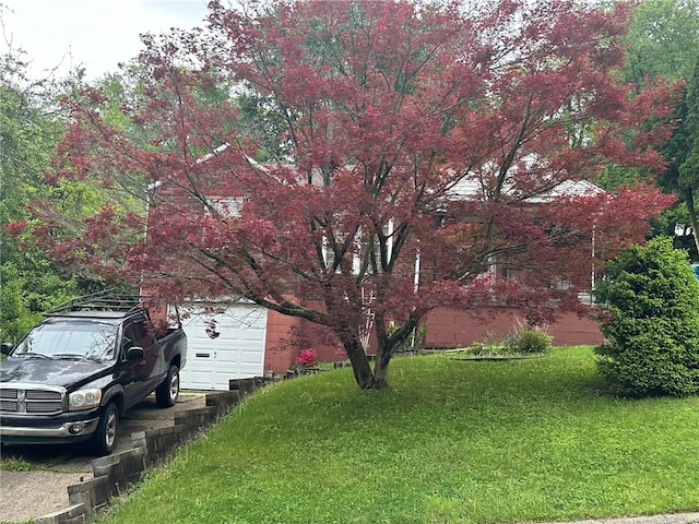 view of yard with a garage