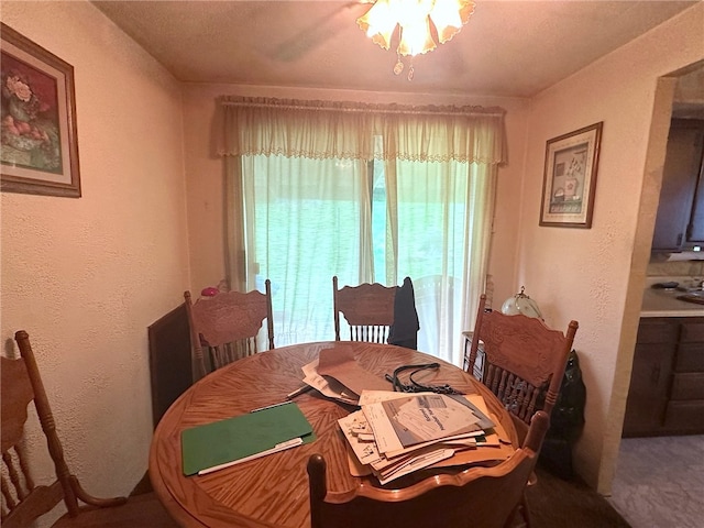 view of carpeted dining space