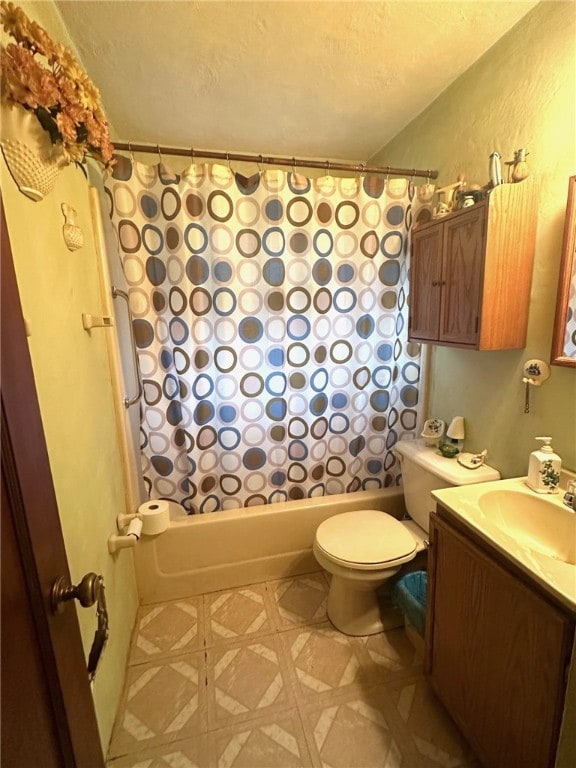 full bathroom featuring shower / bath combo, toilet, tile flooring, and vanity