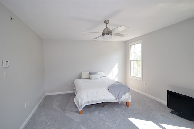 bedroom featuring ceiling fan and carpet floors