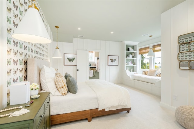 bedroom featuring light colored carpet