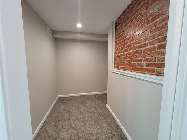 interior space featuring dark colored carpet