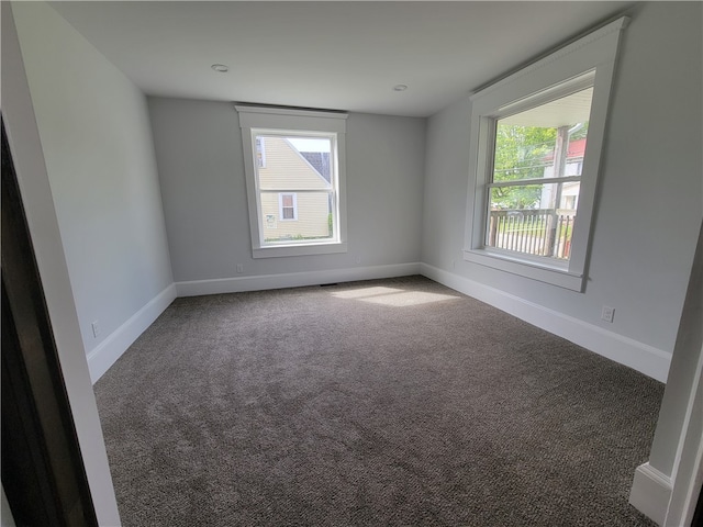 view of carpeted spare room