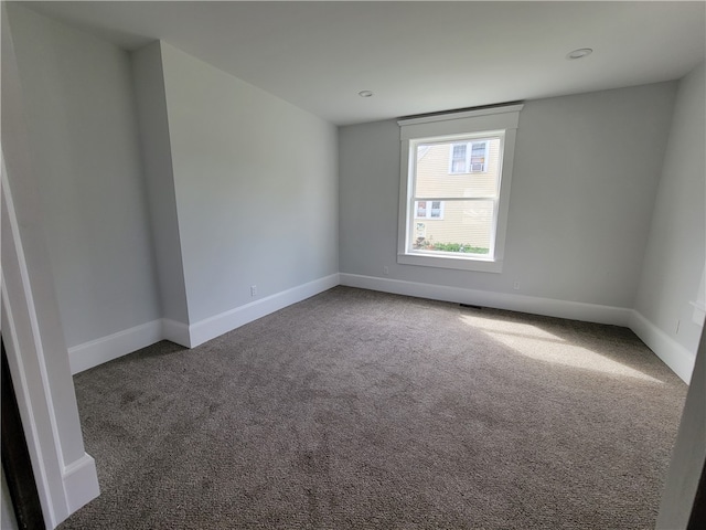 view of carpeted spare room