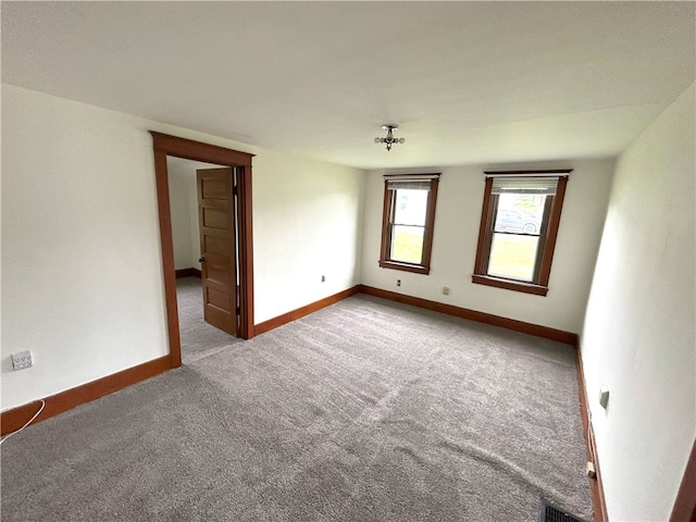 view of carpeted spare room