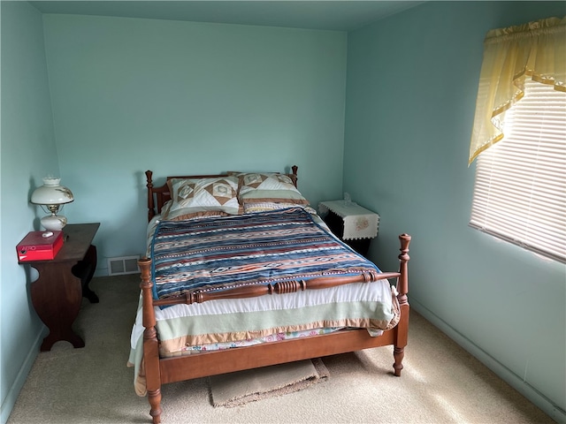 bedroom featuring carpet flooring