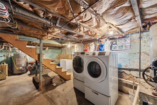 basement with separate washer and dryer and gas water heater