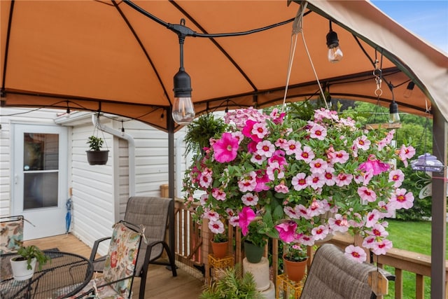 wooden terrace with a gazebo