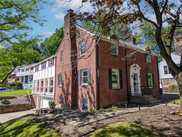 view of property exterior with a garage