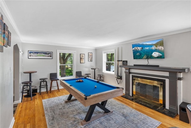 playroom with wood-type flooring, ornamental molding, and pool table