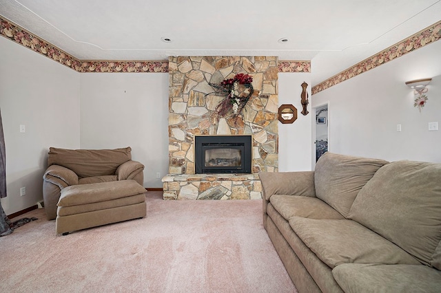 carpeted living room with a fireplace