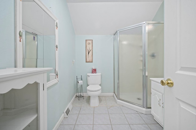 bathroom with an enclosed shower, vanity, toilet, and tile floors