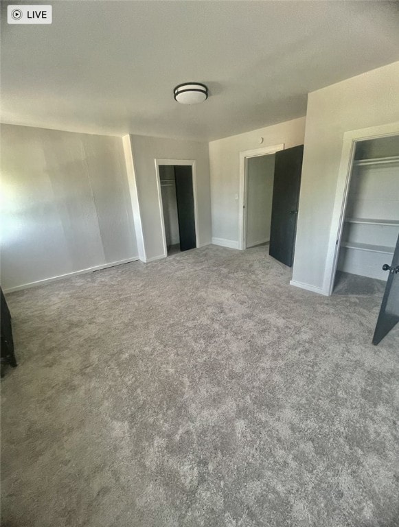 unfurnished bedroom with carpet floors