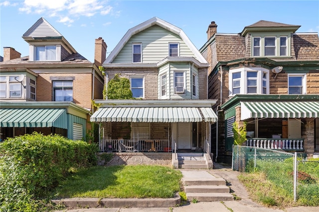 view of front of home featuring covered porch