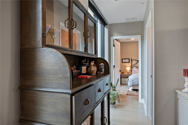 hallway featuring light hardwood / wood-style floors