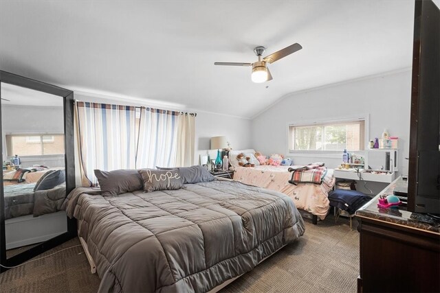 carpeted bedroom featuring ceiling fan and lofted ceiling