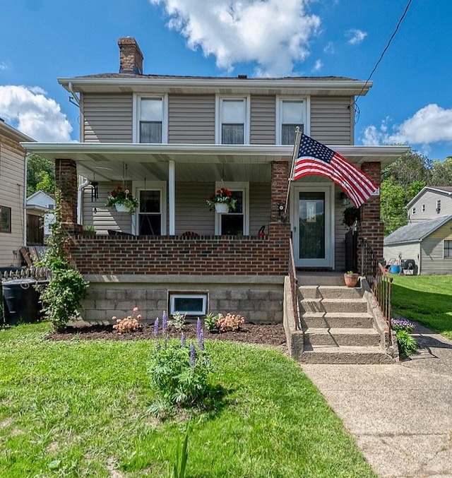 view of front of property with a front yard