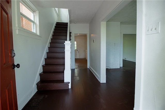 entrance foyer with dark hardwood / wood-style flooring