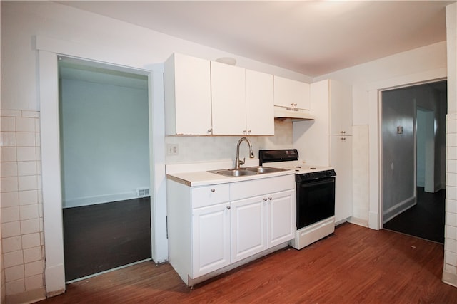 kitchen featuring electric stove, white cabinets, and hardwood / wood-style flooring