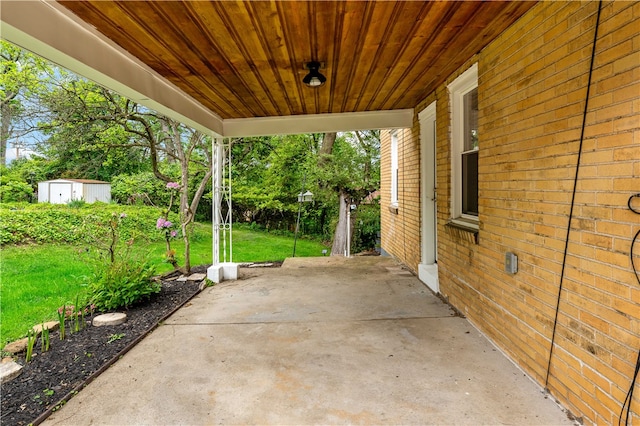 view of terrace with a storage unit