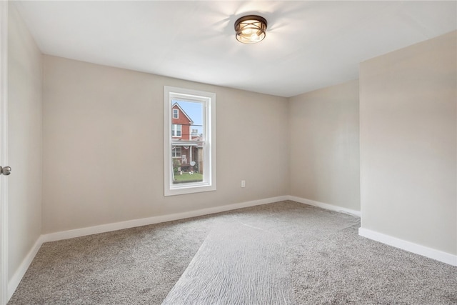 unfurnished room with carpet