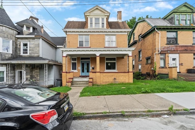 view of front of home featuring covered porch