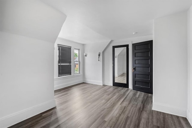 interior space with dark hardwood / wood-style floors