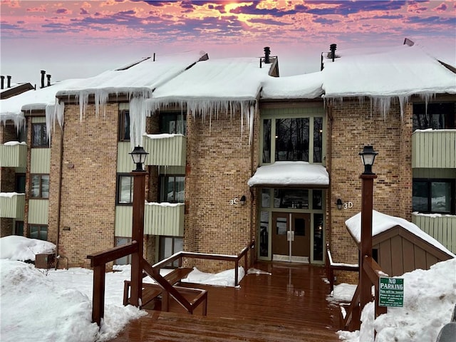 view of snow covered building