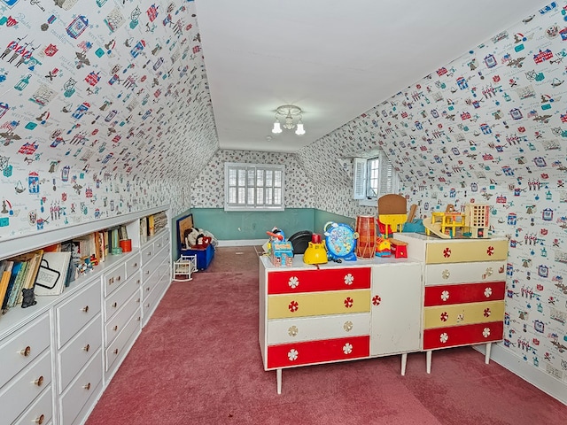 bedroom featuring lofted ceiling and carpet