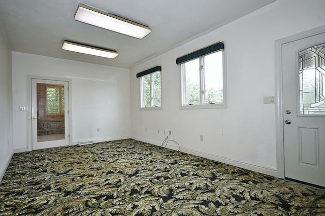 view of carpeted spare room