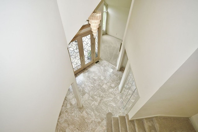 interior space featuring carpet floors and french doors